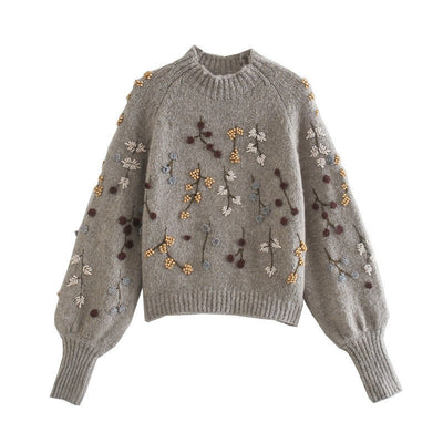 Fiorella - Strickpullover mit Perlenschmuck