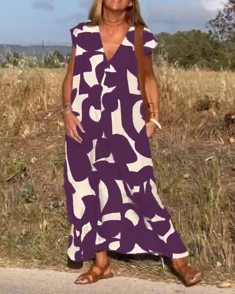 NAOMI | Langes Kleid mit V-Ausschnitt und ausgestelltem Schnitt für einen Urlaubslook
