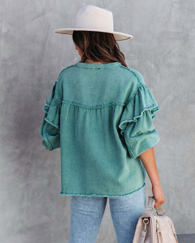 Bridget - Denim-Bluse mit Perlen und Rüschenärmeln