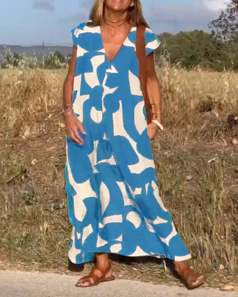 NAOMI | Langes Kleid mit V-Ausschnitt und ausgestelltem Schnitt für einen Urlaubslook