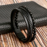 Here’s the translation into German:  Leder Herren-Armbandset - Armand in Schwarz