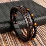 Here’s the translation into German:  Leder Herren-Armbandset - Armand in Braun
