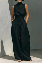 Nerina - Ärmelloser Jumpsuit mit weitem Bein in Schwarz