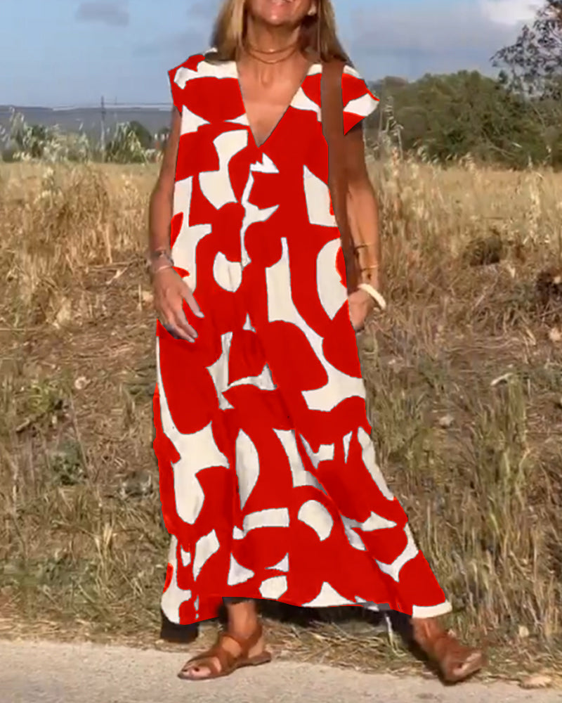 NAOMI | Langes Kleid mit V-Ausschnitt und ausgestelltem Schnitt für einen Urlaubslook