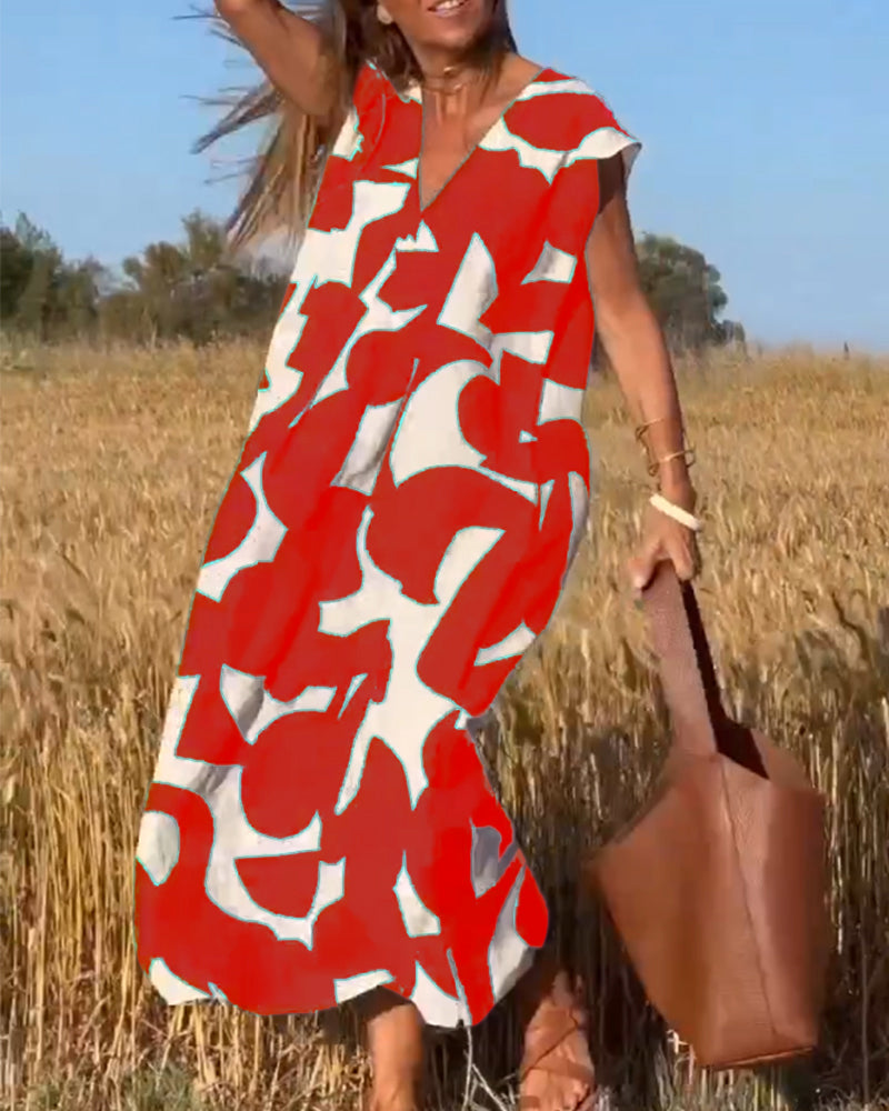 NAOMI | Langes Kleid mit V-Ausschnitt und ausgestelltem Schnitt für einen Urlaubslook