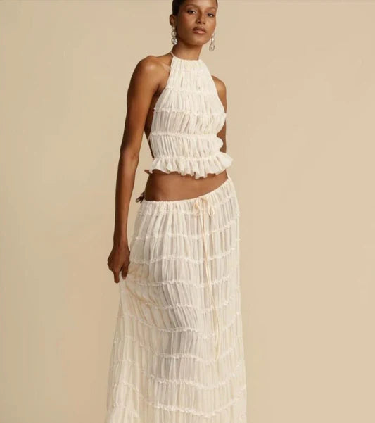 Top met halternek &amp; halflange rok