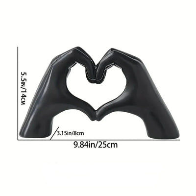 Moderne Herzgesten-Skulptur