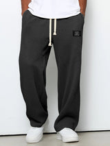 Herren nan lässige Waffelstrick Loungehose mit Kordelzug und geradem Schnitt Drune in Schwarz