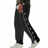 Herren nan weite Trackpants mit seitlicher Druckknopfleiste, elastischem Bund und reflektierendem Streamline-Streifen Drune in Schwarz