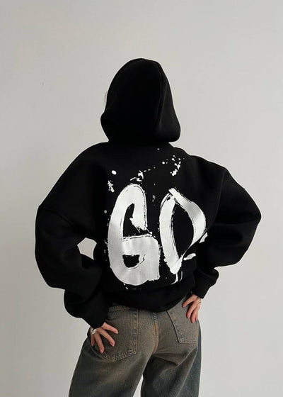 Oversized Hoodie mit abstraktem Rückendruck – Urban, Cozy & Ausdrucksstark