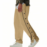 Herren nan weite Trackpants mit seitlicher Druckknopfleiste, elastischem Bund und reflektierendem Streamline-Streifen Drune in Khaki
