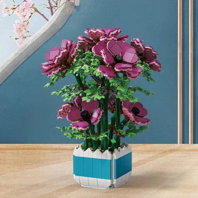 Saras kreative Cymbidium-Blumen-Baustein-Pflanze im Topf