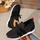Romy - Sneakers für Frauen in Schwarz