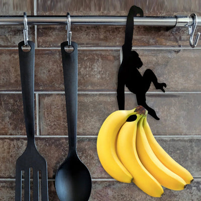 Verspielter Affen-Bananenhalter