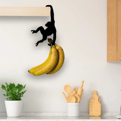 Verspielter Affen-Bananenhalter