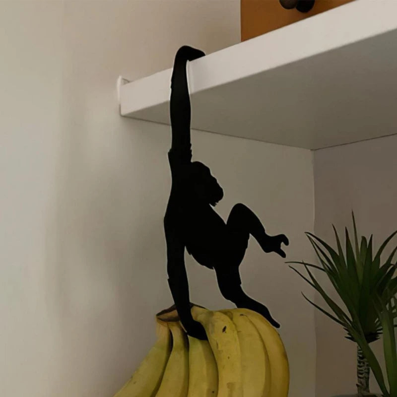 Verspielter Affen-Bananenhalter