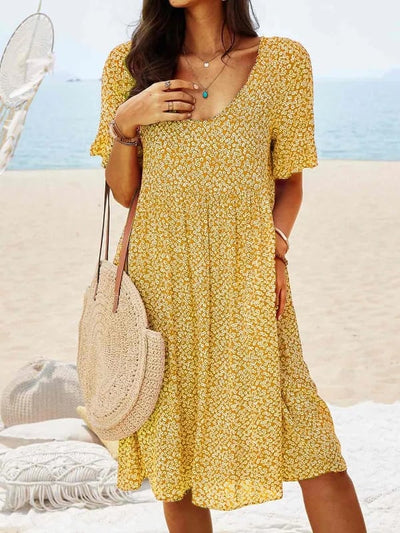 Verspieltes Blumenkleid mit Rundhalsausschnitt
