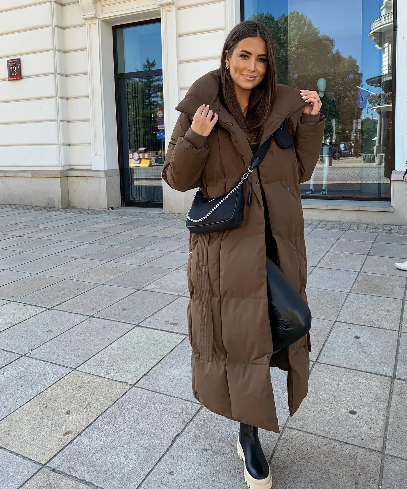 Magdalena - Lange gesteppte pufferjacke mit gürtel