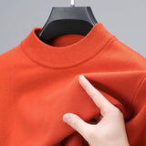 Sian | Kaschmir-Sweater mit geripptem Saum in Orange
