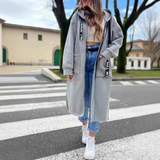 Corinna | Damen Lange Winterjacke mit Kapuze in Grau