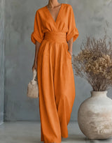 Xylora - Hochwertiger weitbeiniger Jumpsuit mit V-Ausschnitt in Orange