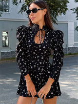 Damen Mini-Kleid mit Blumenmuster und Stehkragen mit Schnürung und Puffärmeln in Schwarz