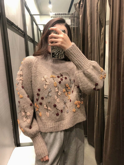 Fiorella - Strickpullover mit Perlenschmuck