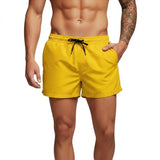 Herren Badeshorts mit elastischem Bund und Kordelzug in Gelb