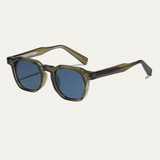 Herren Sonnenbrille mit transparenter eckiger Fassung und gemusterten Bügeln in Grun Blau
