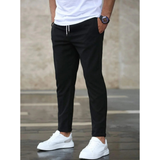 Niklas | Herren Schmale Jogger Chino Hose mit Kordelzug in Schwarz