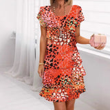 Jonna - Stilvolles Kleid Mit Leopard Enmuster Und Pailletten in Orange